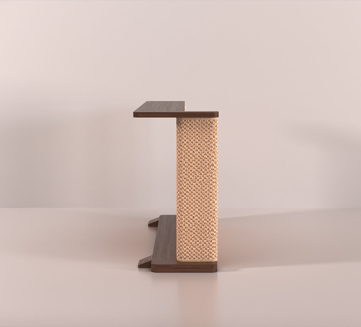 A Cat-e-Corner table placed next to a sofa, integrating a cat's scratching post with a small table, in a room with a plant and a colorful cushion.