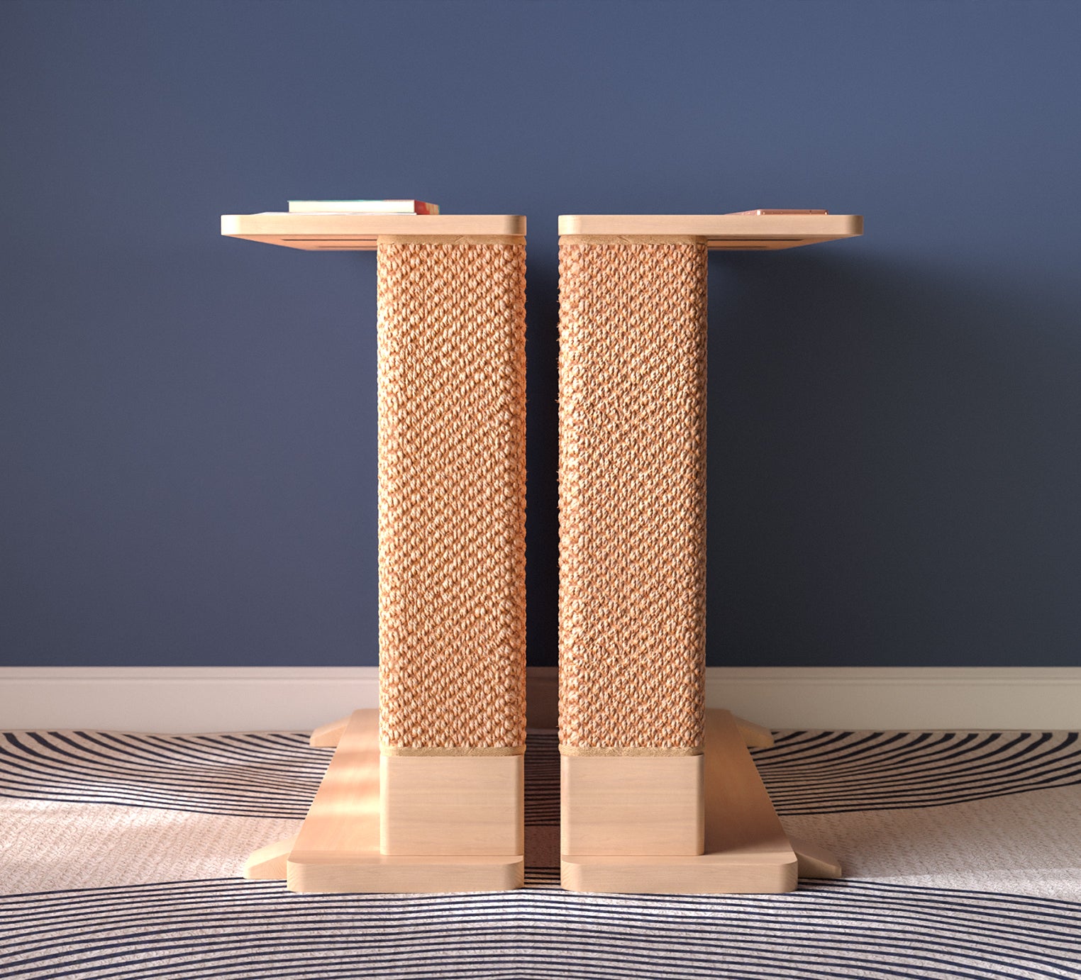 A Cat-e-Corner table placed next to a sofa, integrating a cat's scratching post with a small table, in a room with a plant and a colorful cushion.